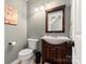 Well-lit powder room featuring elegant fixtures and decor at 2532 Annecy Dr, Matthews, NC 28105