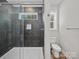 Modern bathroom featuring tiled shower and glass door at 297 Barr Link Rd, Mount Pleasant, NC 28124