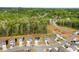 Aerial view of the new homes in a suburban neighborhood with lush green surroundings at 3118 Maple Ridge Dr # 11, Gastonia, NC 28052
