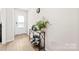 Inviting entryway with wood-look flooring and a console table adding character at 3118 Maple Ridge Dr # 11, Gastonia, NC 28052