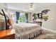 Bedroom showcasing natural light from a window, light walls, and carpeted floors at 3207 Oak Ridge Cir, Lincolnton, NC 28092