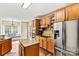 Well-equipped kitchen with stainless steel appliances, granite countertops, and a center island at 3207 Oak Ridge Cir, Lincolnton, NC 28092