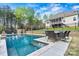 Beautiful backyard pool with an outdoor dining area and a view of the home's screened in porch at 3207 Oak Ridge Cir, Lincolnton, NC 28092
