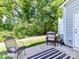 Private backyard oasis with patio, cozy seating, and lush greenery, perfect for outdoor relaxation and entertainment at 3524 Auburn Curb Rd, Charlotte, NC 28217