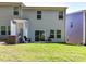Spacious backyard with a well-maintained lawn and a patio area, ideal for outdoor gatherings and relaxation at 3524 Auburn Curb Rd, Charlotte, NC 28217