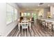 Open-concept dining area connects kitchen and living spaces, featuring lots of natural light at 3524 Auburn Curb Rd, Charlotte, NC 28217
