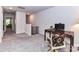 Upstairs space used as a home office; ready for remote work and study with natural light at 3524 Auburn Curb Rd, Charlotte, NC 28217
