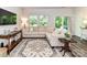 Comfortable living room showcasing neutral furniture, hardwood floors, and ample natural light at 3524 Auburn Curb Rd, Charlotte, NC 28217