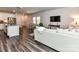 Open-concept space with stainless appliances, dining, and cozy living room area at 3524 Auburn Curb Rd, Charlotte, NC 28217