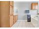 Well-maintained bathroom with tiled floors, built-in storage cabinets, and a separate tub at 365 Kinder Rd, Harmony, NC 28634