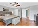 Light-filled bedroom with hardwood floors, a ceiling fan, and neutral color scheme at 365 Kinder Rd, Harmony, NC 28634