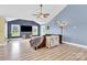 Spacious living room boasts vaulted ceilings, recessed lighting, and neutral color palette at 365 Kinder Rd, Harmony, NC 28634