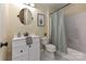 Modern bathroom featuring a shower-tub combo with a curtain, and updated vanity at 3701 Slagle Dr, Charlotte, NC 28215
