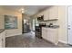 Bright kitchen with stainless steel appliances, white cabinets, and granite countertops at 3701 Slagle Dr, Charlotte, NC 28215
