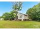 Well-maintained backyard featuring a screened-in porch and mature trees providing shade and privacy at 3790 Lynnview Ct, Maiden, NC 28650