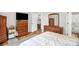 Spacious bedroom with wooden dressers and an open door view of the bathroom at 3790 Lynnview Ct, Maiden, NC 28650