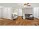 Open living room featuring hard wood floors and plenty of natural light at 3790 Lynnview Ct, Maiden, NC 28650