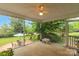 The spacious screened porch overlooking a lush, well-maintained backyard at 3790 Lynnview Ct, Maiden, NC 28650