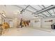 A spacious garage featuring an open design with exposed ceiling beams at 380 Hamrick Rd # 1, Gastonia, NC 28056