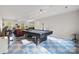 Spacious recreation room with a pool table illuminated by stylish track lighting at 380 Hamrick Rd # 1, Gastonia, NC 28056