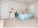Comfortable bedroom features a ceiling fan, neutral carpet, and cozy decor, a relaxing retreat at 4024 Whipcord Dr, Waxhaw, NC 28173
