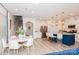 Open-concept living space features a kitchen, dining area, and staircase in a bright, airy, and inviting layout at 4024 Whipcord Dr, Waxhaw, NC 28173