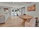 Open-concept dining area with a round table, leading to a bright living space at 4205 Cahnnas Way, Waxhaw, NC 28173