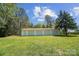 Spacious three-car garage on a well-maintained lawn, offering ample storage and parking at 4205 Cahnnas Way, Waxhaw, NC 28173