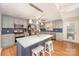 Well-appointed kitchen with stainless steel appliances, custom cabinets, and a stylish island at 424 Mirror Lake Rd, Salisbury, NC 28146