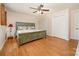 Spacious main bedroom features a ceiling fan, double closets, and light-colored walls at 424 Mirror Lake Rd, Salisbury, NC 28146