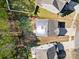 Aerial view of the property line revealing the solar paneling on the roof and the home's footprint at 428 Winecoff Woods Nw Dr, Concord, NC 28027