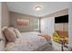 Cozy bedroom featuring carpet, one window with blinds, closet and stylish décor at 428 Winecoff Woods Nw Dr, Concord, NC 28027