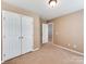 Bedroom featuring neutral paint, carpet, ceiling fan, and closet at 431 Harvest Ter, Lake Wylie, SC 29710