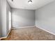 Neutral-toned bedroom with wall-to-wall carpeting, a single window, and a spacious, empty floor plan at 431 Harvest Ter, Lake Wylie, SC 29710