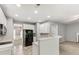 Modern kitchen featuring white cabinetry, black appliances, and an open layout at 431 Harvest Ter, Lake Wylie, SC 29710