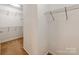 Walk-in closet with wire shelving and beige carpet at 431 Harvest Ter, Lake Wylie, SC 29710