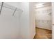 Walk-in closet featuring wire shelving and beige carpet at 431 Harvest Ter, Lake Wylie, SC 29710