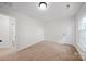 Bright bedroom with neutral carpet, fresh paint and ample natural light at 4700 Aldersbrook Dr, Monroe, NC 28110