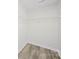 Walk-in closet includes overhead storage shelf and modern flooring at 4700 Aldersbrook Dr, Monroe, NC 28110