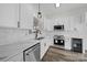 Modern kitchen features white cabinets, stainless appliances, and marble countertops at 4700 Aldersbrook Dr, Monroe, NC 28110