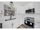 Modern kitchen boasts stainless appliances, and a stylish sink and faucet at 4700 Aldersbrook Dr, Monroe, NC 28110