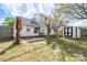 Backyard patio with pergola, landscaping and storage shed at 4700 Aldersbrook Dr, Monroe, NC 28110