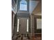 Welcoming foyer with high ceilings, large window, and hardwood floors at 5025 Wicklow Dr, Gastonia, NC 28054
