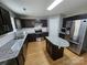Modern kitchen features stainless steel appliances, granite countertops, and an island at 5025 Wicklow Dr, Gastonia, NC 28054