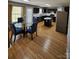 Dining area featuring a kitchen with dark cabinetry and granite countertops at 5025 Wicklow Dr, Gastonia, NC 28054