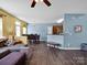 Open living area with dining space features hardwood flooring and neutral paint colors at 5102 Candleglow Ct, Indian Trail, NC 28079