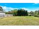 Large, grassy backyard with wooden fence at 534 Georgia Ave, Statesville, NC 28677