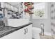 Chic bathroom featuring a modern vessel sink, stylish fixtures, gray walls, and wood shelving at 534 Georgia Ave, Statesville, NC 28677