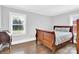 Bedroom with wood flooring, neutral paint, and natural light at 534 Georgia Ave, Statesville, NC 28677