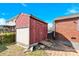 Exterior shot of shed in backyard with brick home in the background at 534 Georgia Ave, Statesville, NC 28677